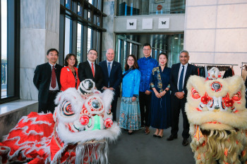 Image LtoR: Lion Dancers with Mr Paul Chin and Ms Jenny Too - NZ Chinese Association, His Excellency Dr. Wang Xiaolong - Ambassador of the People's Republic of China, Prime Minister, Rt Hon Christopher Luxon, Minister for Ethnic Communities - Hon Melissa Lee, Dr Carlos Cheung MP and Nancy Liu MP Co-emcees and Chief Executive for the Ministry Mervin Singham.